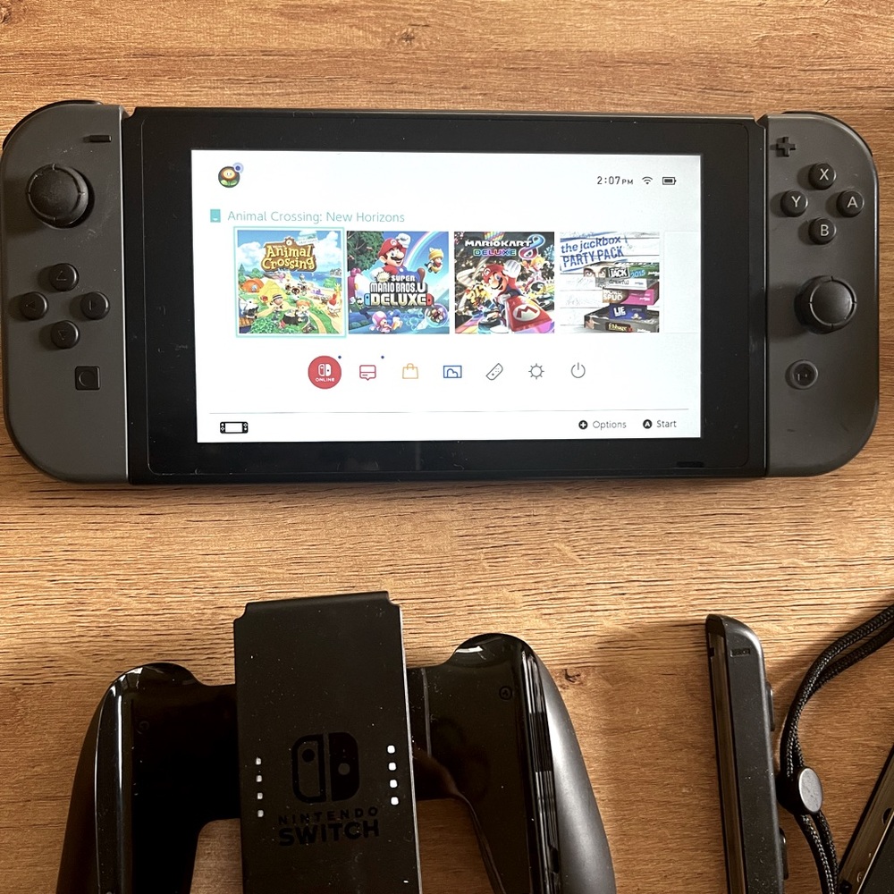 Barely Used Nintendo Switch w/ Grey Joy-Con. TV Mode Console & Handheld device.